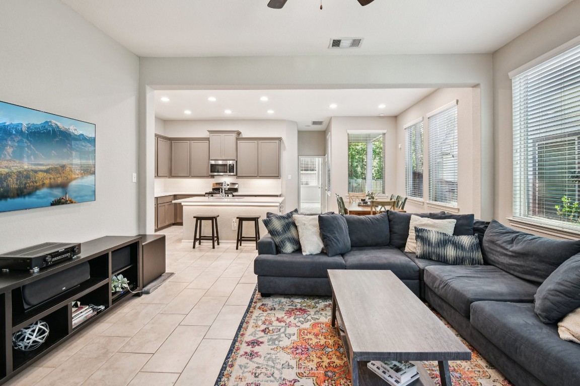 230 Biltmore Loop Montgomery, TX 77316 - Photo 6 of 39 Living area is open to both the kitchen and dining areas - perfect for entertaining!