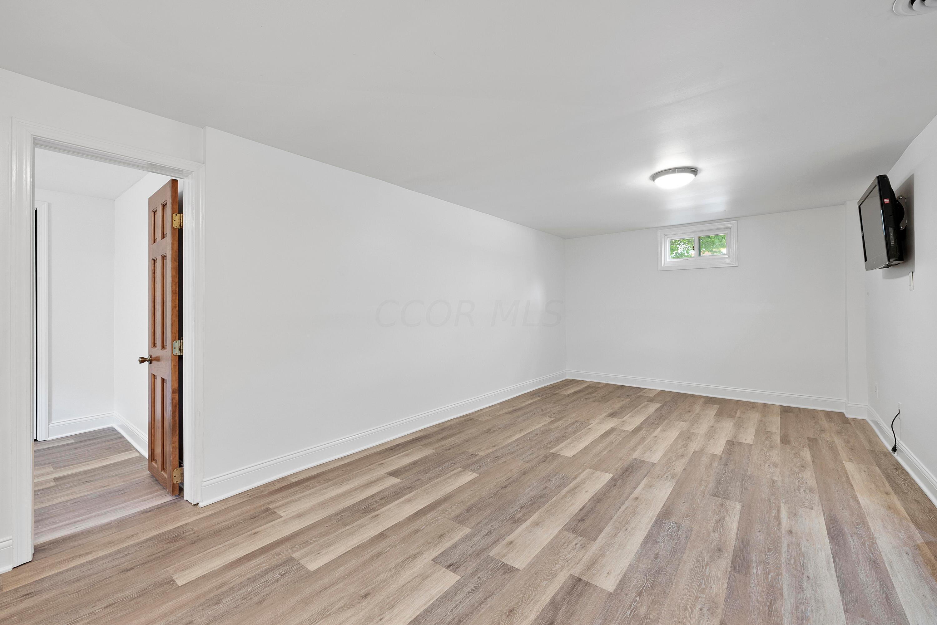 2483 Fishinger Road Columbus, OH 43221 - Photo 25 of 38 Downstairs Rec Room