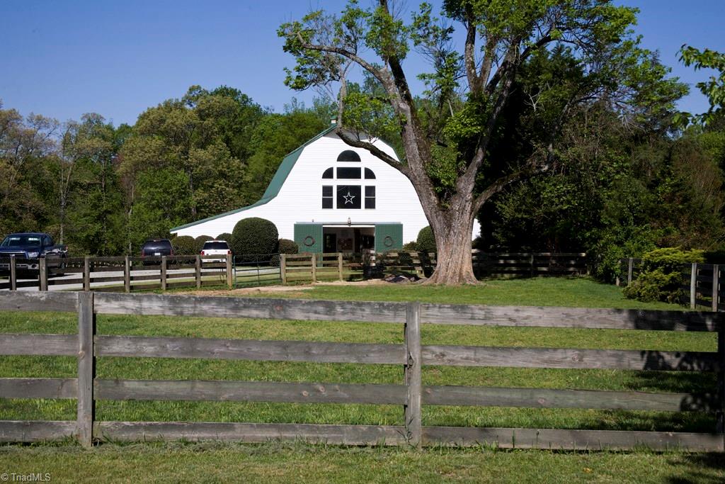 3701 Lewiston Road Greensboro, NC 27410 - Photo 2 of 30 The barn everyone admires! Landmark building on the corner of Lewiston Road and Jessup Grove, is high in style and functionality.