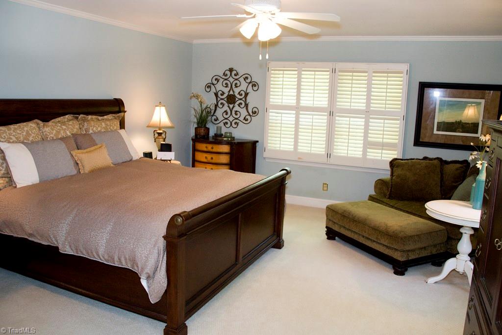 3701 Lewiston Road Greensboro, NC 27410 - Photo 14 of 30 The master's retreat also overlooks garden and the pond. Large and comfortable with good closet space.