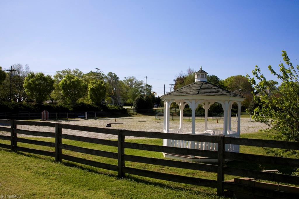 3701 Lewiston Road Greensboro, NC 27410 - Photo 25 of 30 Arena large enough for all riding disciplines, round pen and judges/trainers/spectator viewing gazebo stays.