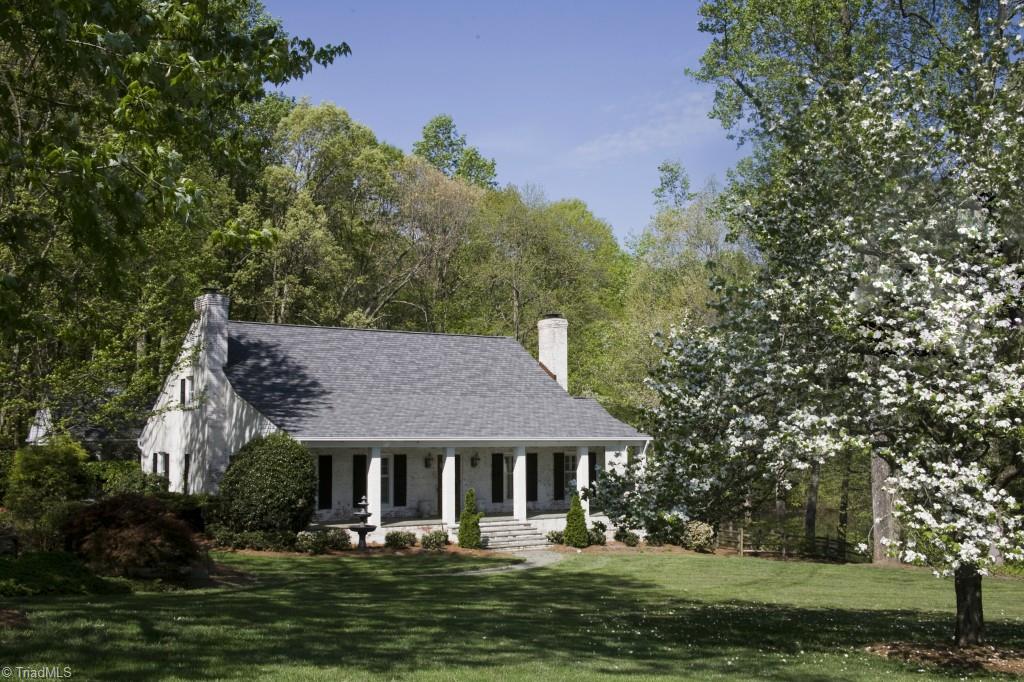 3701 Lewiston Road Greensboro, NC 27410 - Photo 26 of 30 The home sits well away from the barn yet offers views of the pastures.