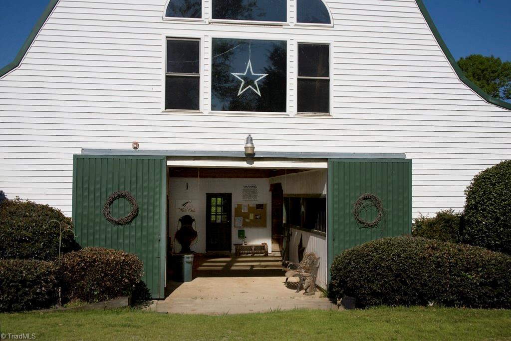 3701 Lewiston Road Greensboro, NC 27410 - Photo 27 of 30 The iconic barn that everyone passes and admires. Concrete center aisle.