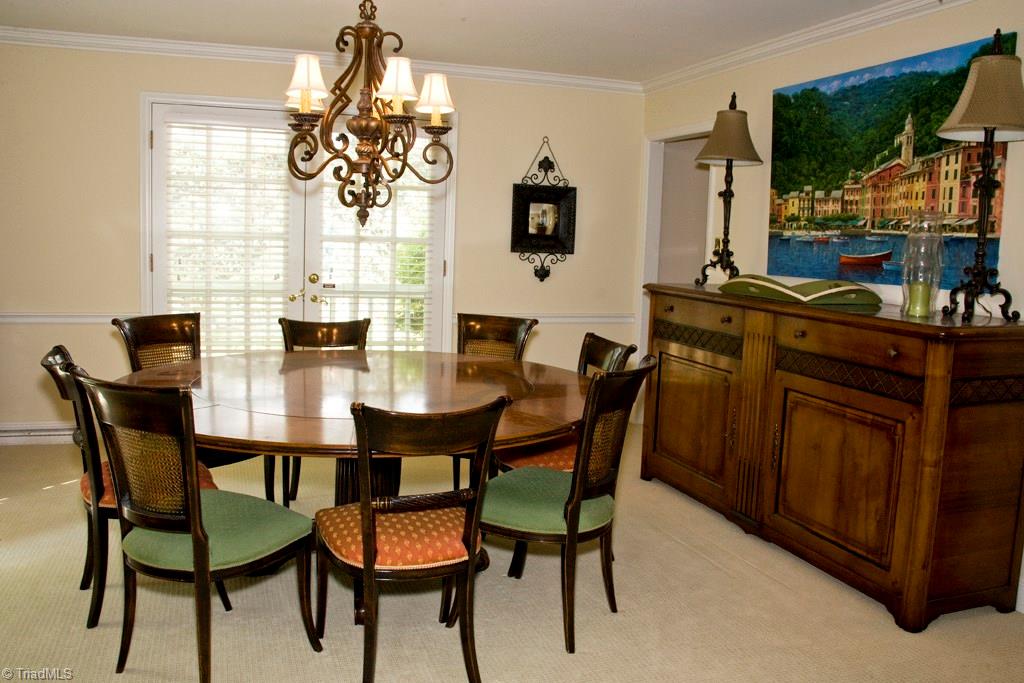 3701 Lewiston Road Greensboro, NC 27410 - Photo 5 of 30 Everyone's favorite dining room. 16x15+ this round table accommodates dinner parties of all sizes. The French doors lead to a private courtyard.