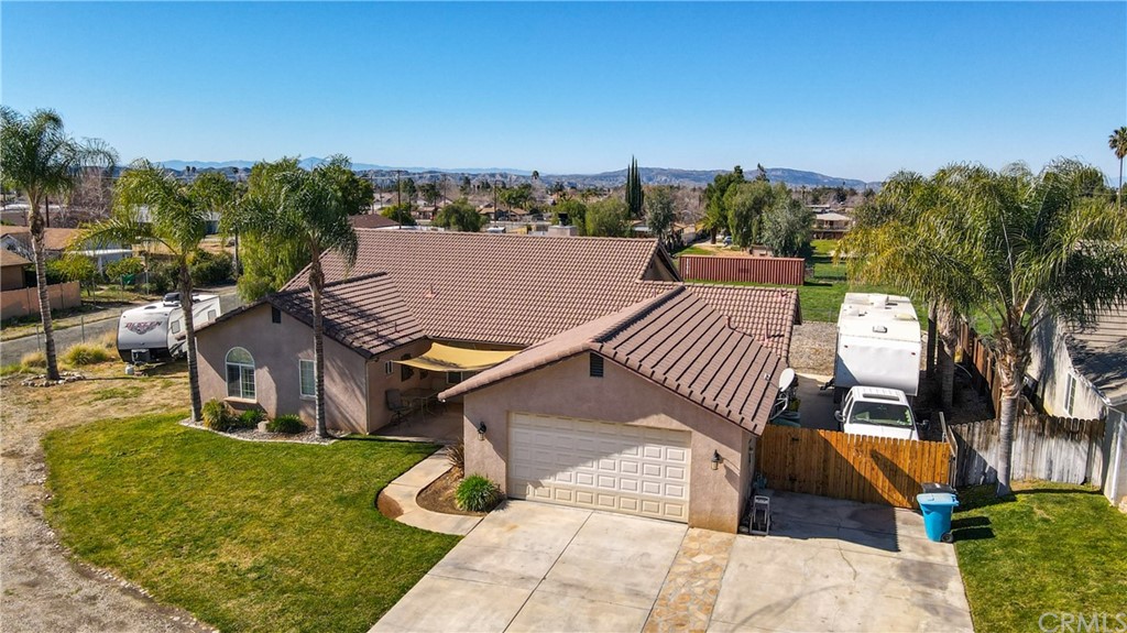 251 West County Line Road Calimesa, CA 92320 - Photo 1 of 1 a view of a patio with a table and chairs