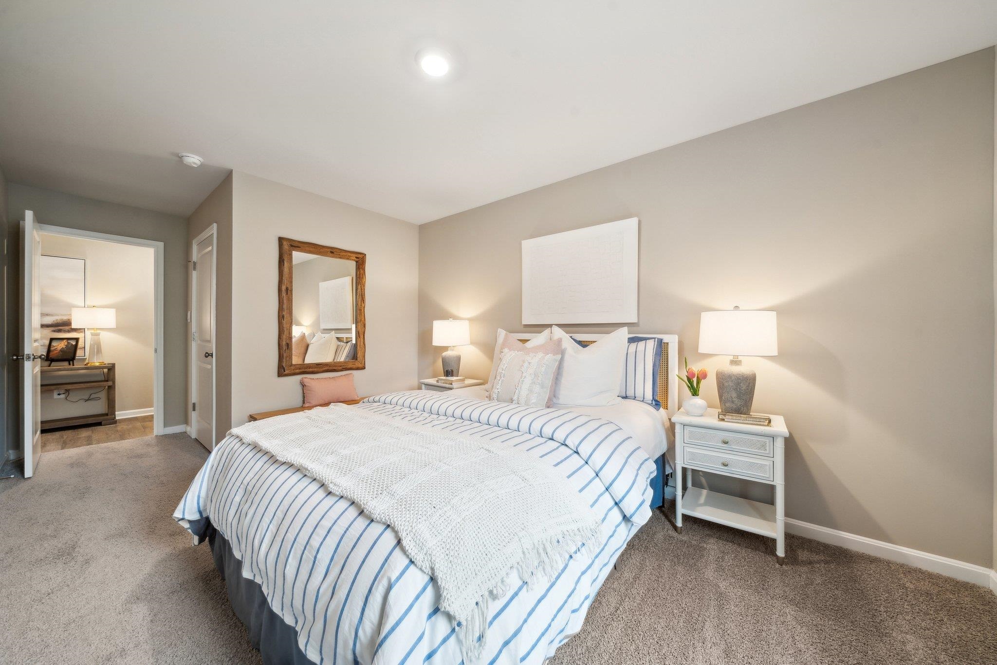 557 Summercrest Avenue Waynesboro, VA 22980 - Photo 9 of 26 a bedroom with a bed and a view of bathroom