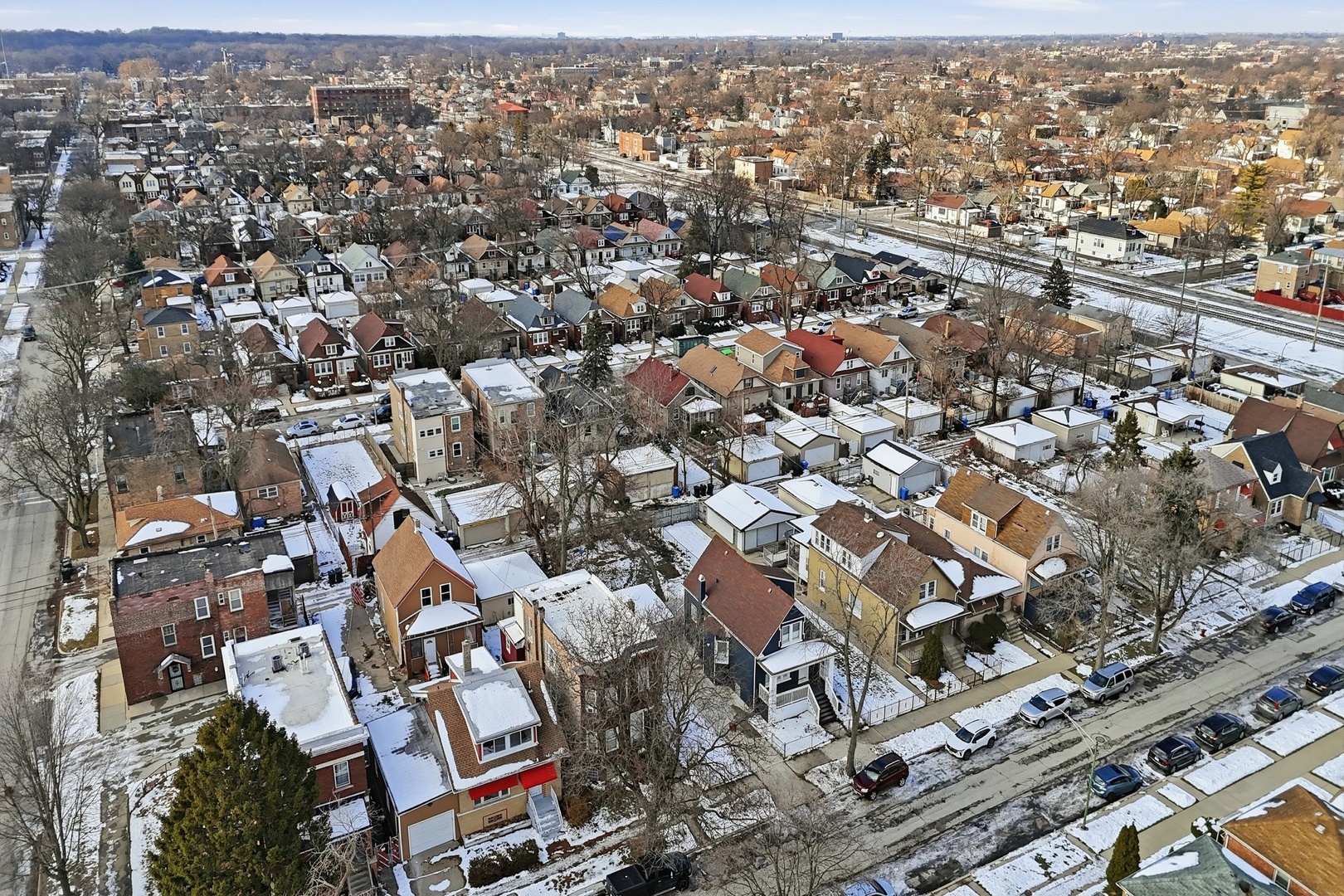 8942 South Aberdeen Street Chicago, IL 60620 - Photo 27 of 35 an aerial view of residential houses with city view