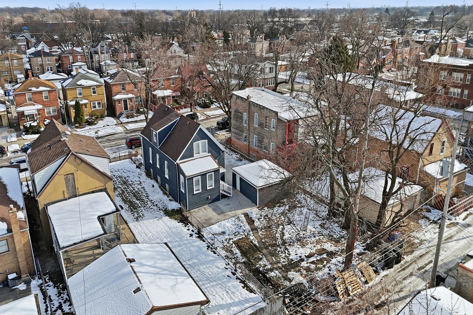 8942 South Aberdeen Street Chicago, IL 60620 - Photo 28 of 35 an aerial view of a city with lots of residential buildings