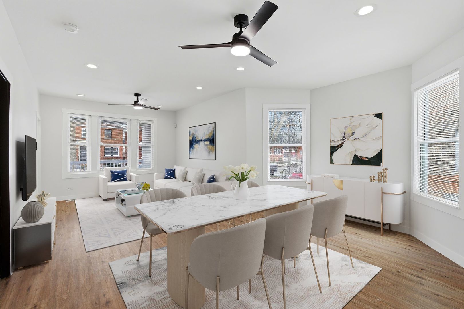8942 South Aberdeen Street Chicago, IL 60620 - Photo 3 of 35 a view of a dining room with furniture and wooden floor