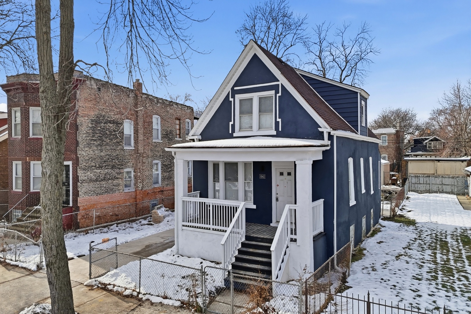 8942 South Aberdeen Street Chicago, IL 60620 - Photo 35 of 35 a front view of a house with balcony