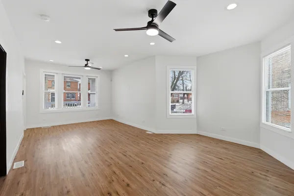 an empty room with windows