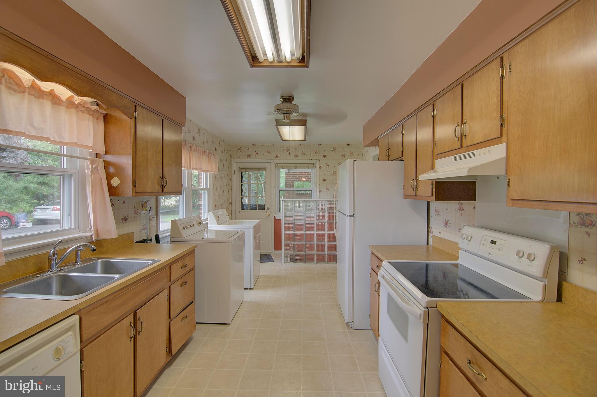 28798 Three Notch Road Mechanicsville, MD 20659 - Photo 7 of 26 What would your vision be in this galley Kitchen?