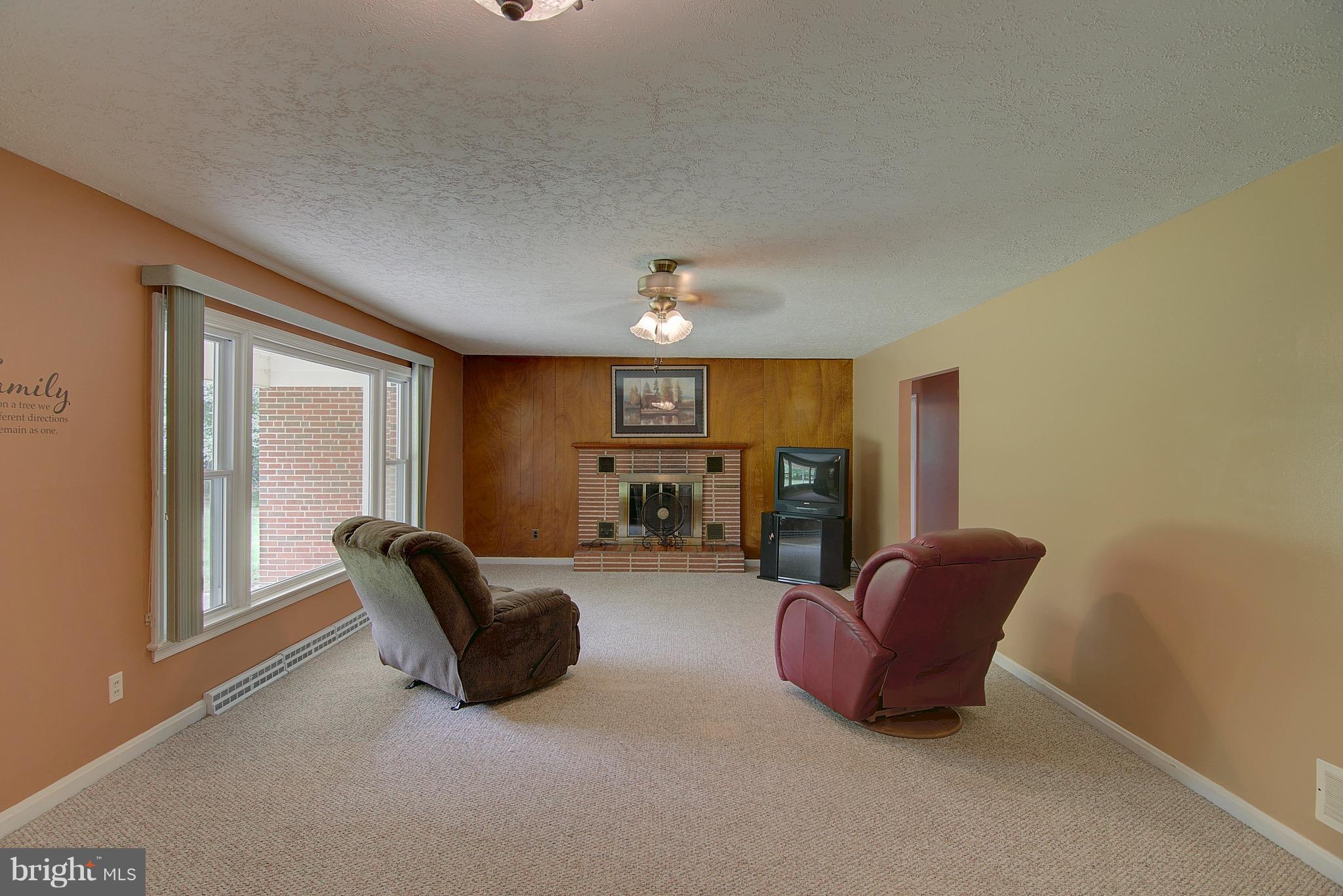 28798 Three Notch Road Mechanicsville, MD 20659 - Photo 10 of 26 Relax by the fire or stare out the picture window
