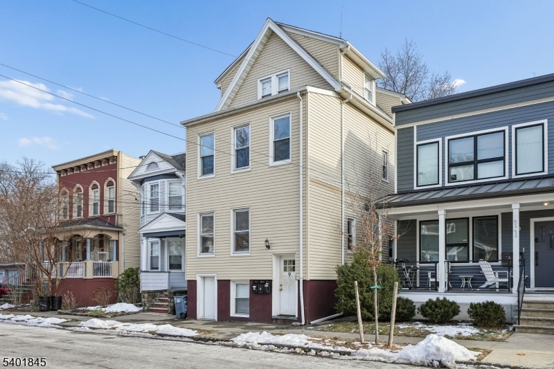 9 Wheeler Street Montclair, NJ 07042 - Photo 13 of 13 a front view of a house with a yard