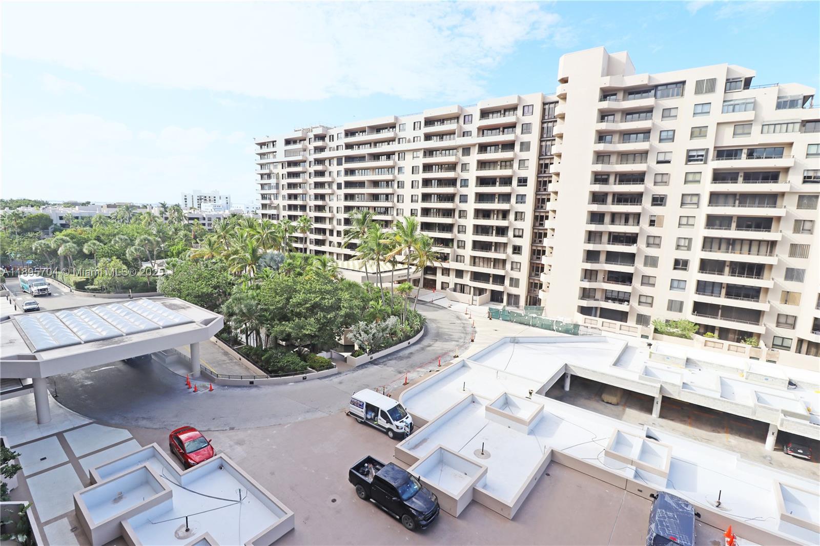 a front view of a building with outdoor seating