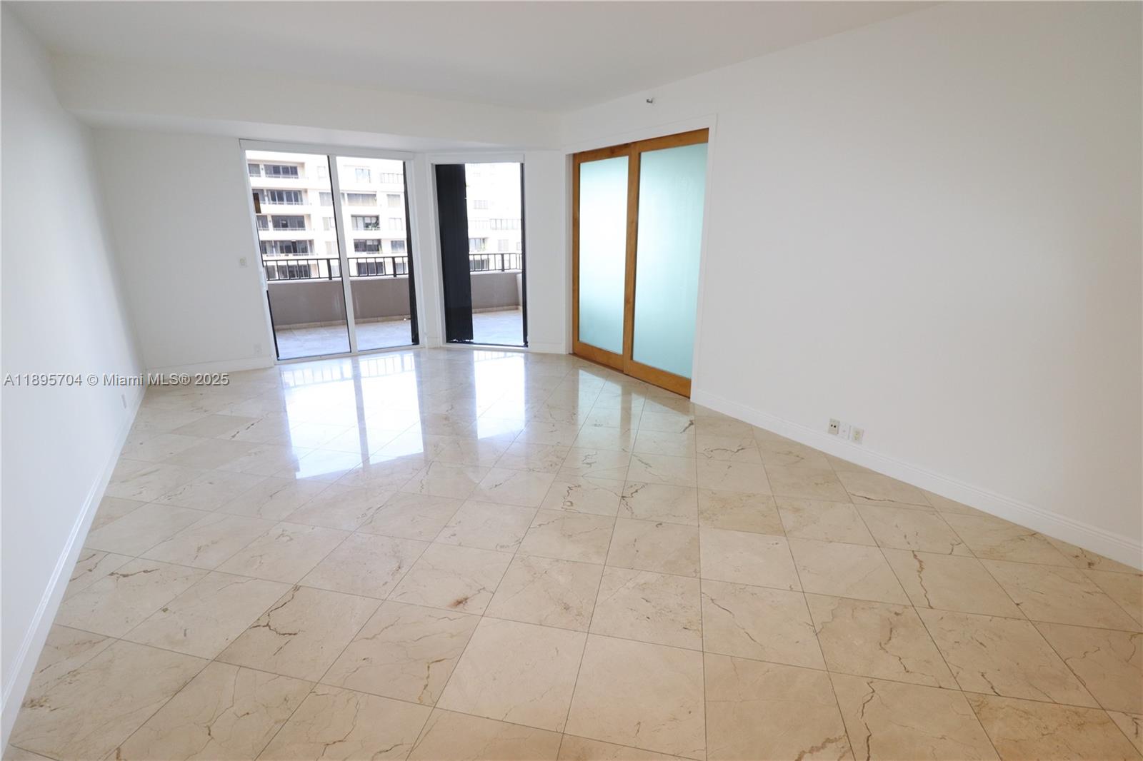 201 Crandon Boulevard, Unit 636 Key Biscayne, FL 33149 - Photo 12 of 53 a view of an empty room and window