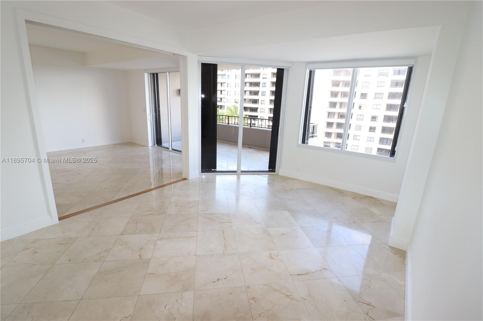 201 Crandon Boulevard, Unit 636 Key Biscayne, FL 33149 - Photo 18 of 53 a view of an empty room with a window