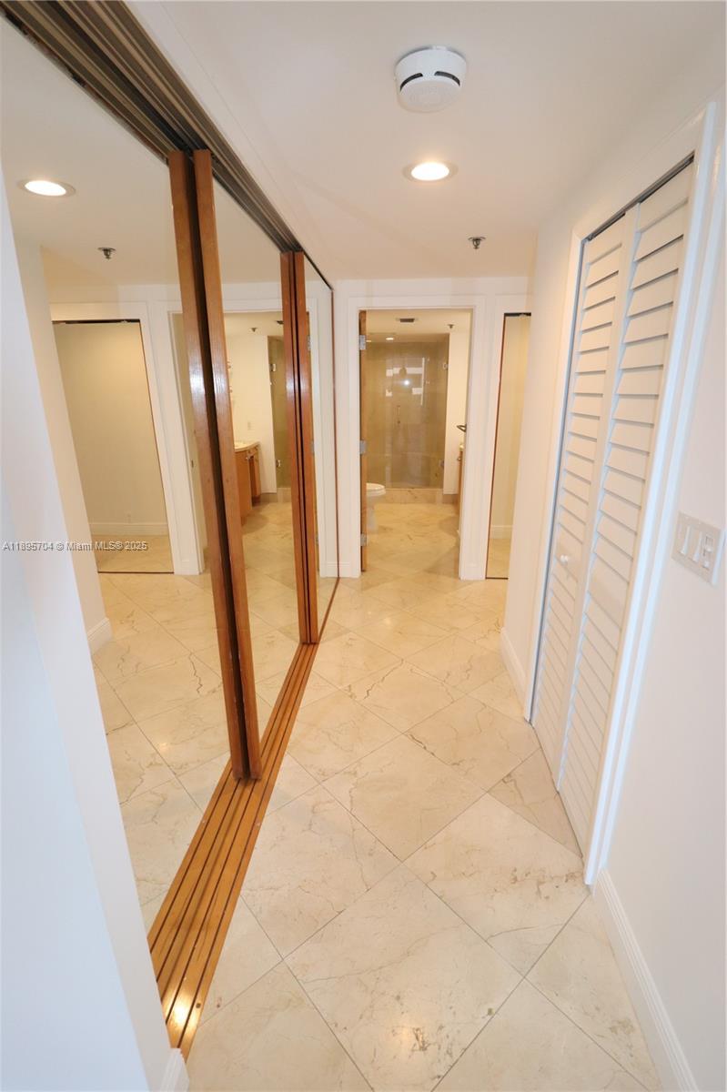 201 Crandon Boulevard, Unit 636 Key Biscayne, FL 33149 - Photo 23 of 53 a view of a hallway