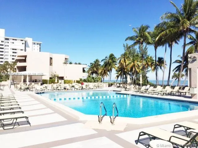 a view of outdoor space with trees all around