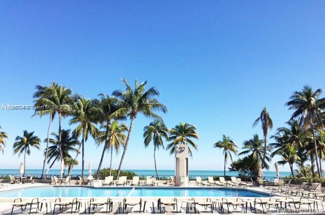 201 Crandon Boulevard, Unit 636 Key Biscayne, FL 33149 - Photo 32 of 53 a view of ocean with a palm trees