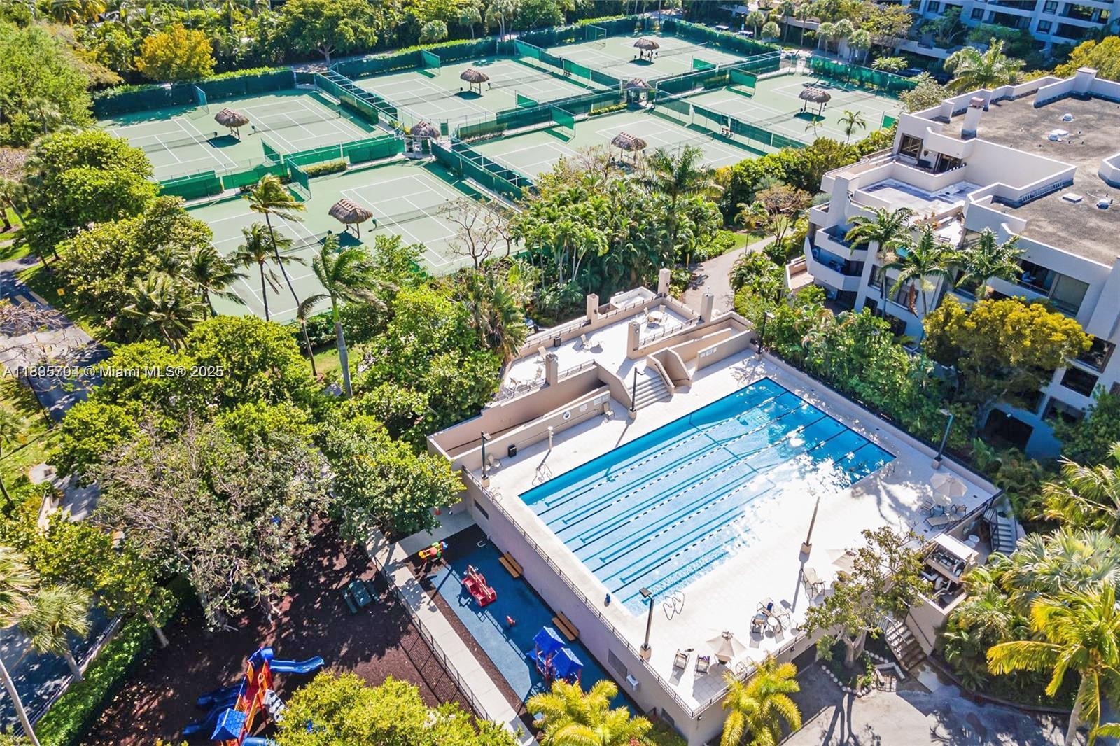 201 Crandon Boulevard, Unit 636 Key Biscayne, FL 33149 - Photo 36 of 53 an aerial view of residential house with outdoor space and swimming pool