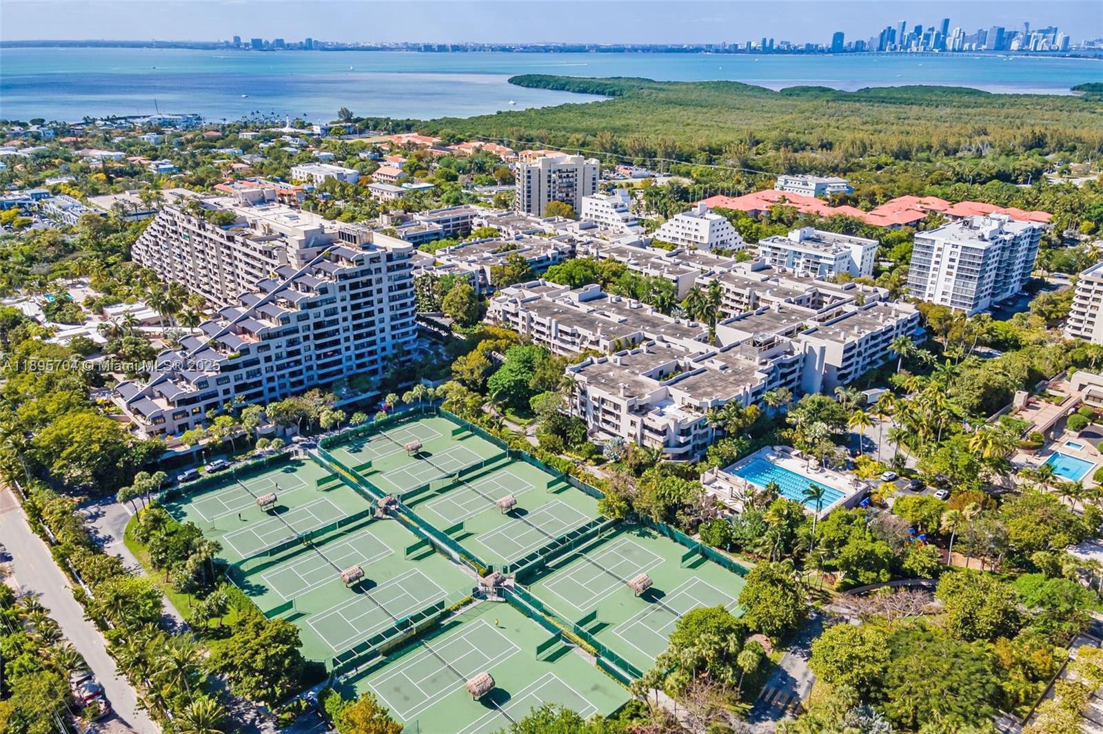 201 Crandon Boulevard, Unit 636 Key Biscayne, FL 33149 - Photo 37 of 53 an aerial view of multiple house