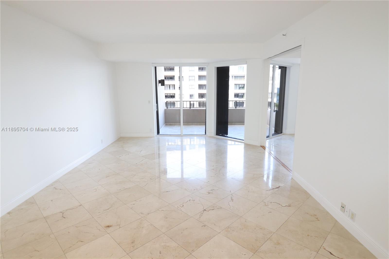 201 Crandon Boulevard, Unit 636 Key Biscayne, FL 33149 - Photo 5 of 53 a view of an empty room with a window