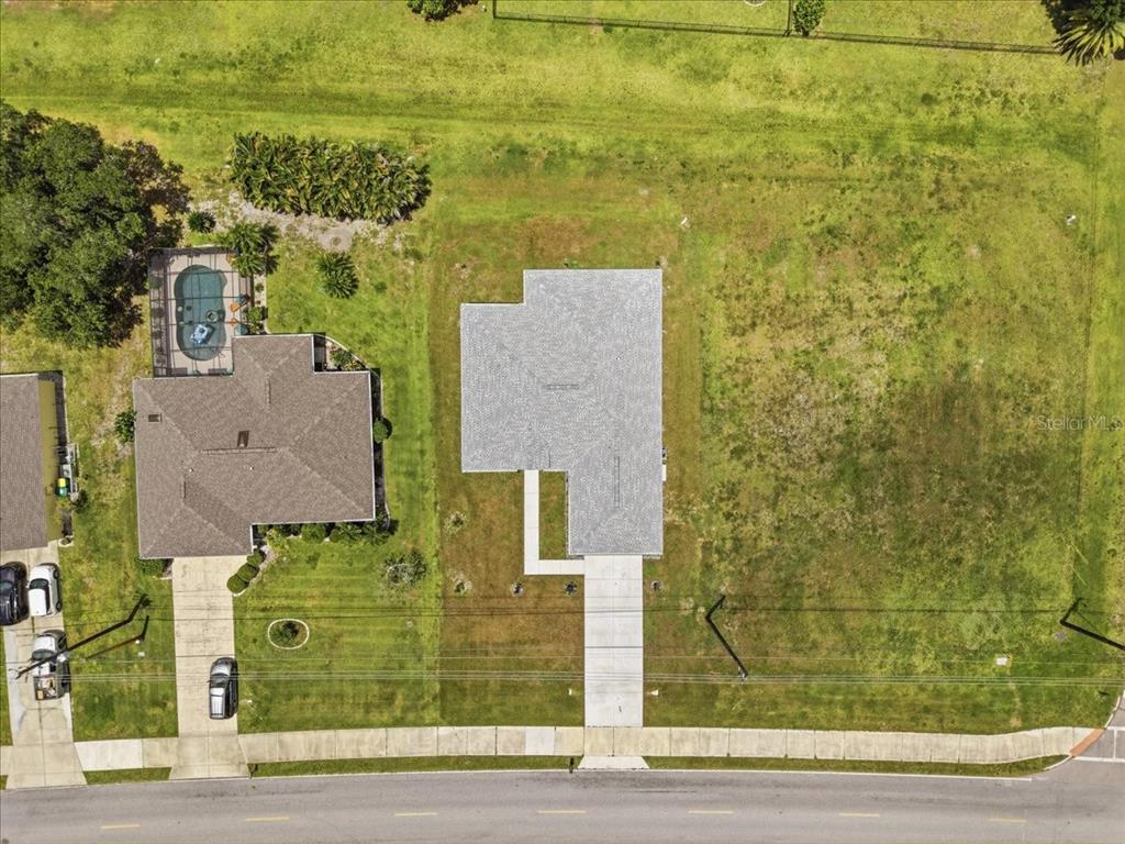 1215 Rio De Janeiro Avenue Punta Gorda, FL 33983 - Photo 65 of 65 an aerial view of residential houses with outdoor space
