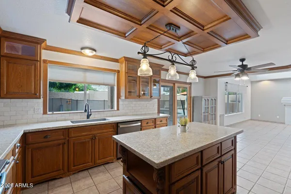 a view of a livingroom with a furniture and a ceiling fan