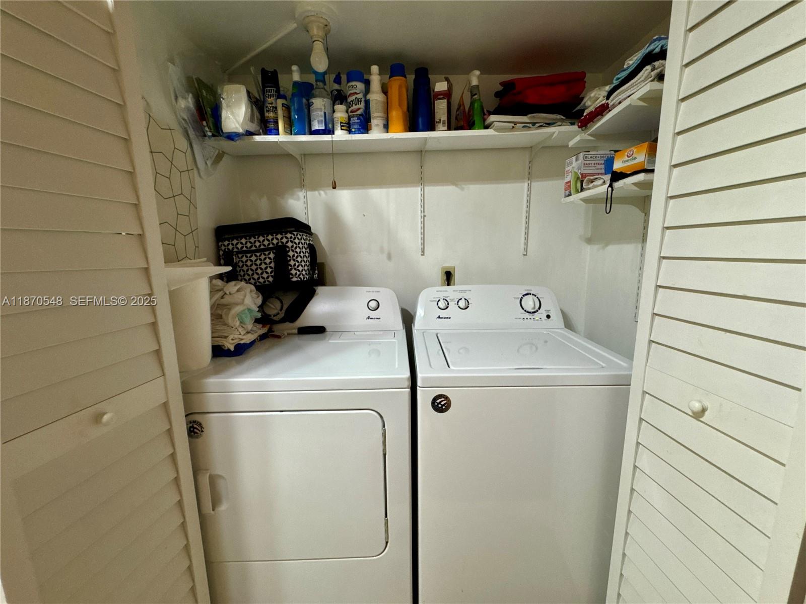13527 Southwest 101st Lane Miami, FL 33186 - Photo 23 of 45 a utility room with dryer and washer