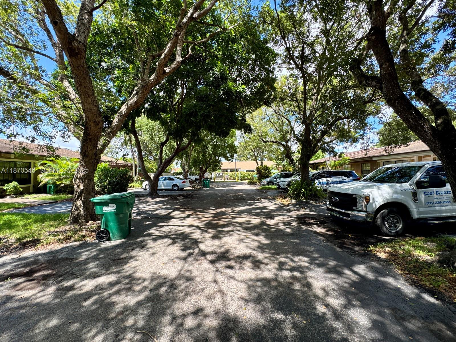 13527 Southwest 101st Lane Miami, FL 33186 - Photo 31 of 45 a view of street with trees