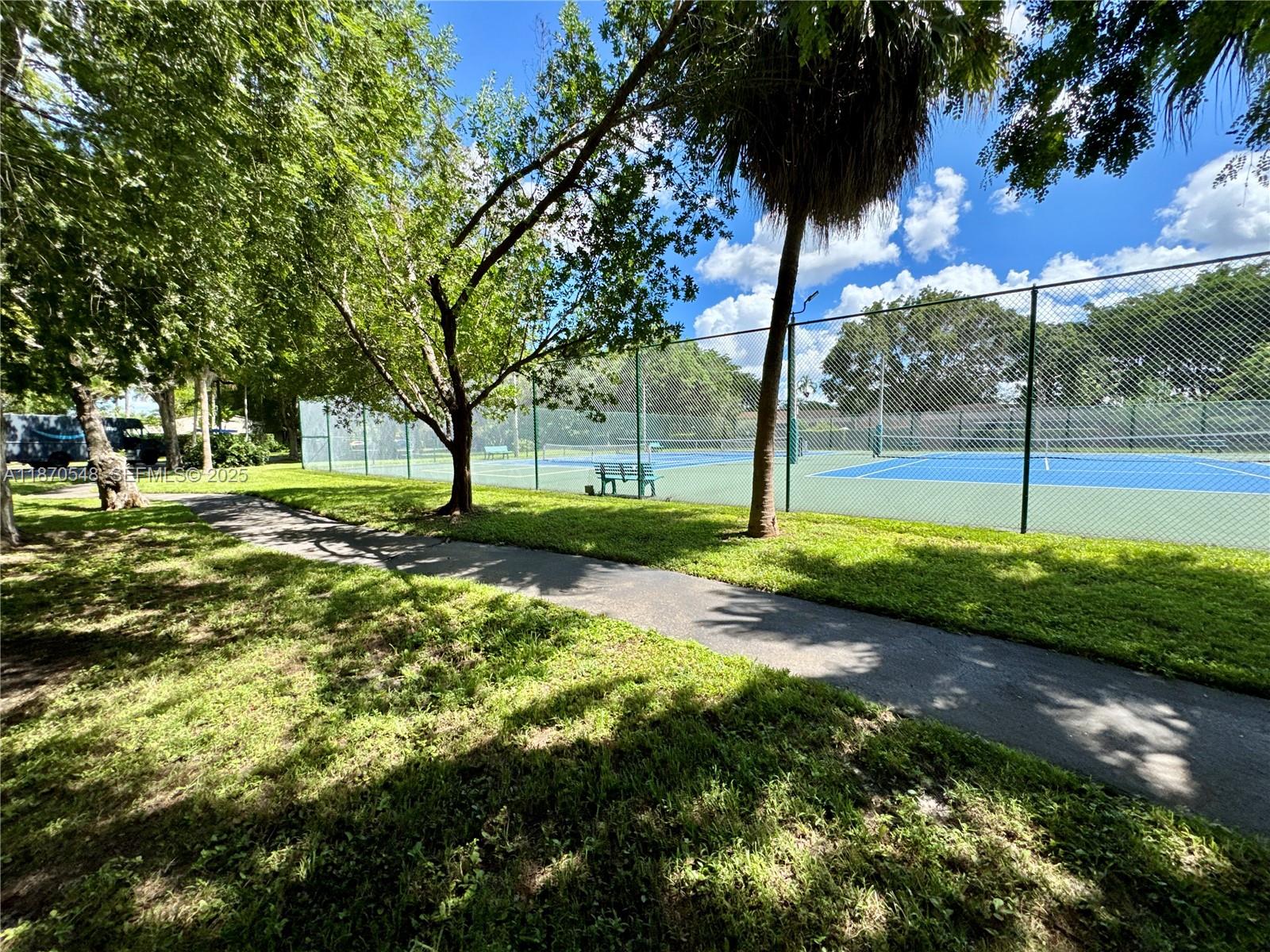 13527 Southwest 101st Lane Miami, FL 33186 - Photo 36 of 45 a view of a park with large trees