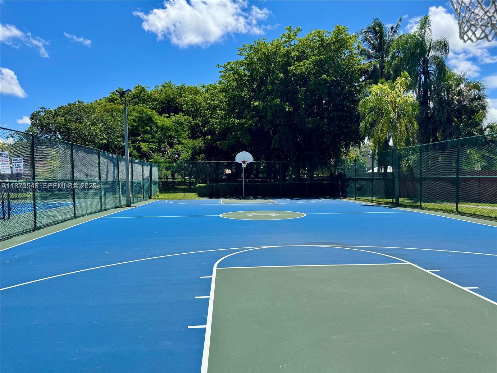 13527 Southwest 101st Lane Miami, FL 33186 - Photo 38 of 45 a view of a tennis court