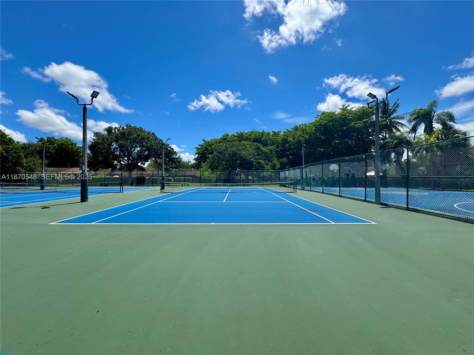 13527 Southwest 101st Lane Miami, FL 33186 - Photo 39 of 45 a view of a tennis court