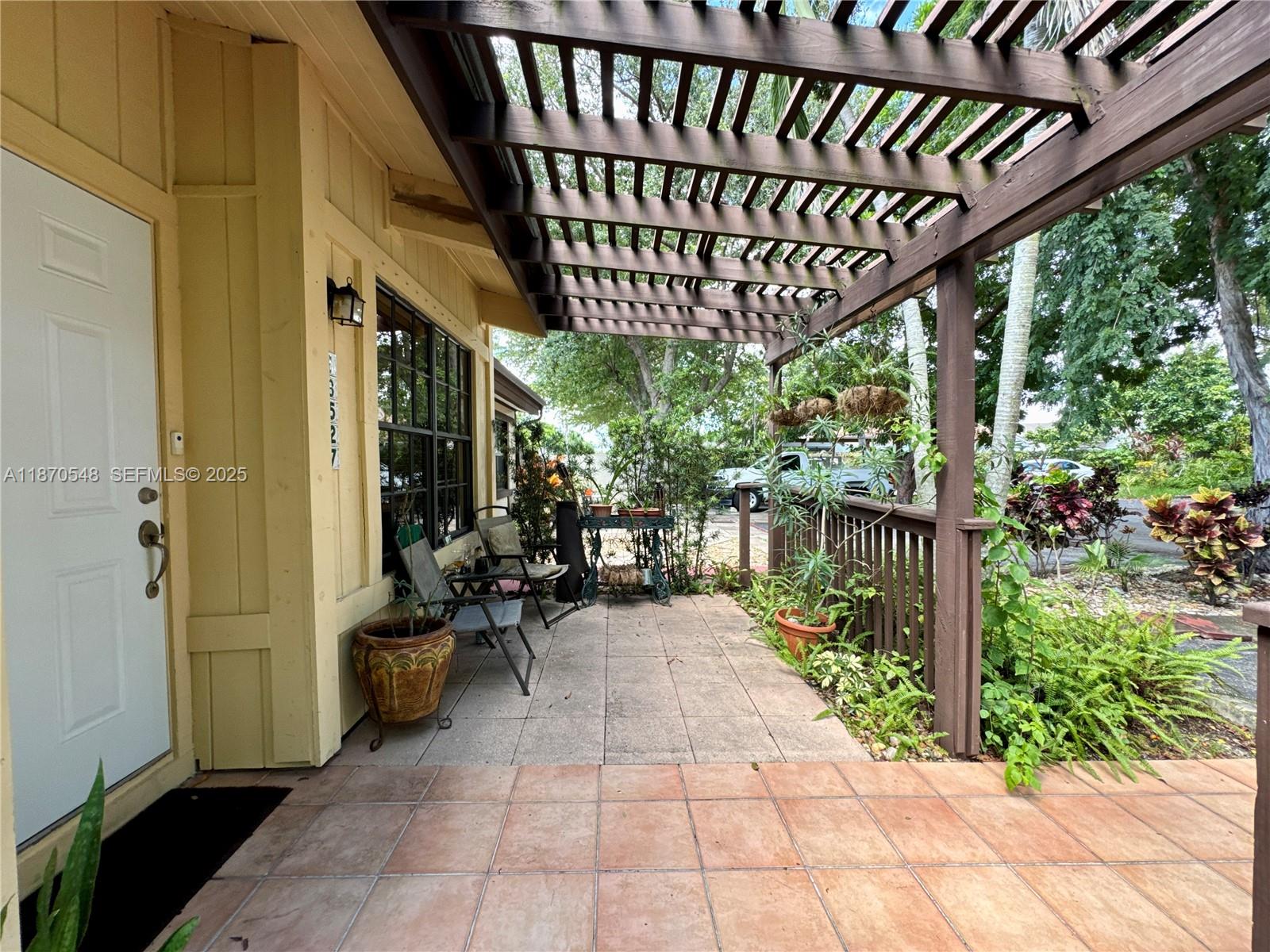 13527 Southwest 101st Lane Miami, FL 33186 - Photo 6 of 45 a view of porch with patio