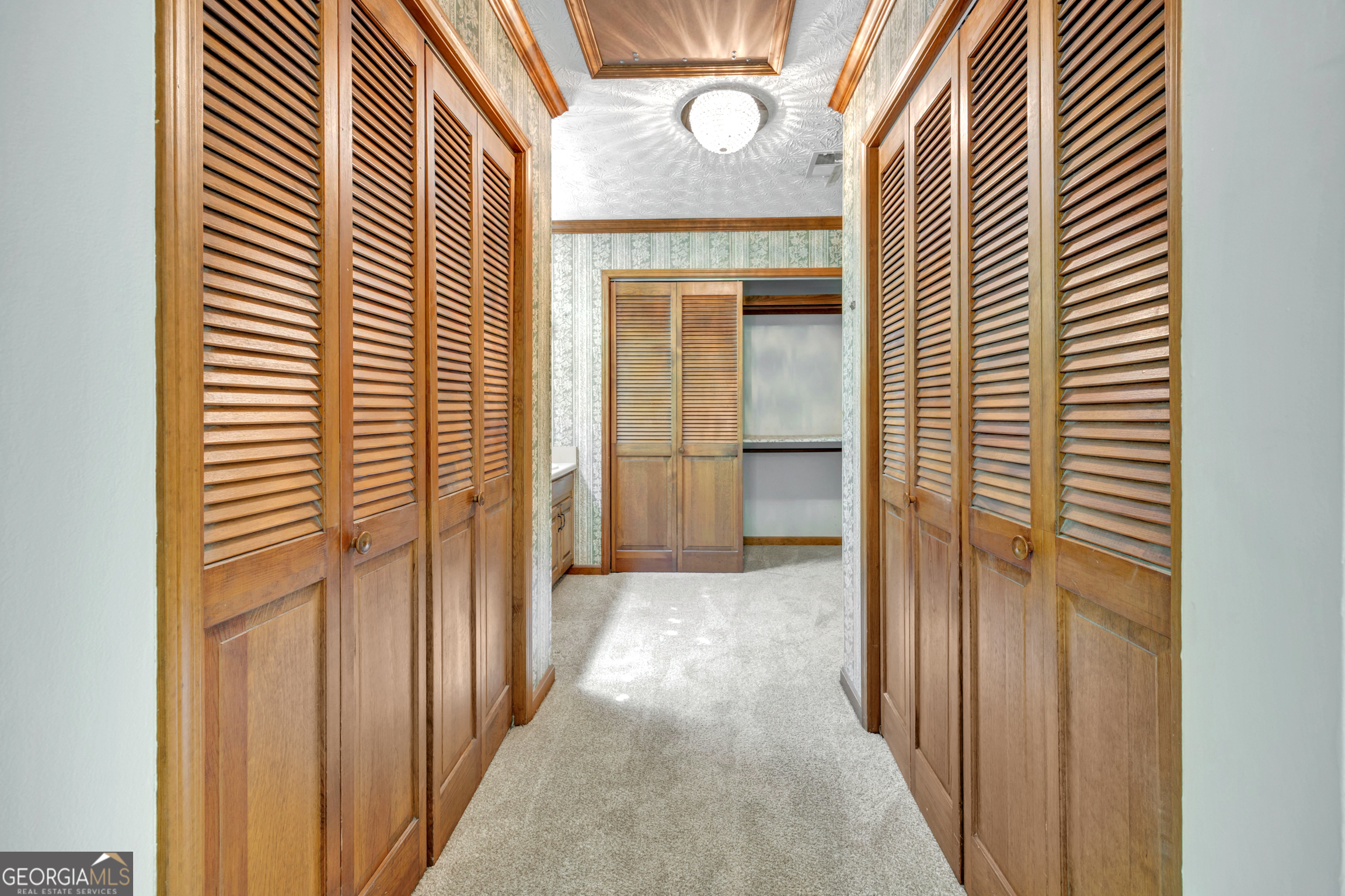400 River Cove Road Social Circle, GA 30025 - Photo 44 of 83 a view of a hallway with a door