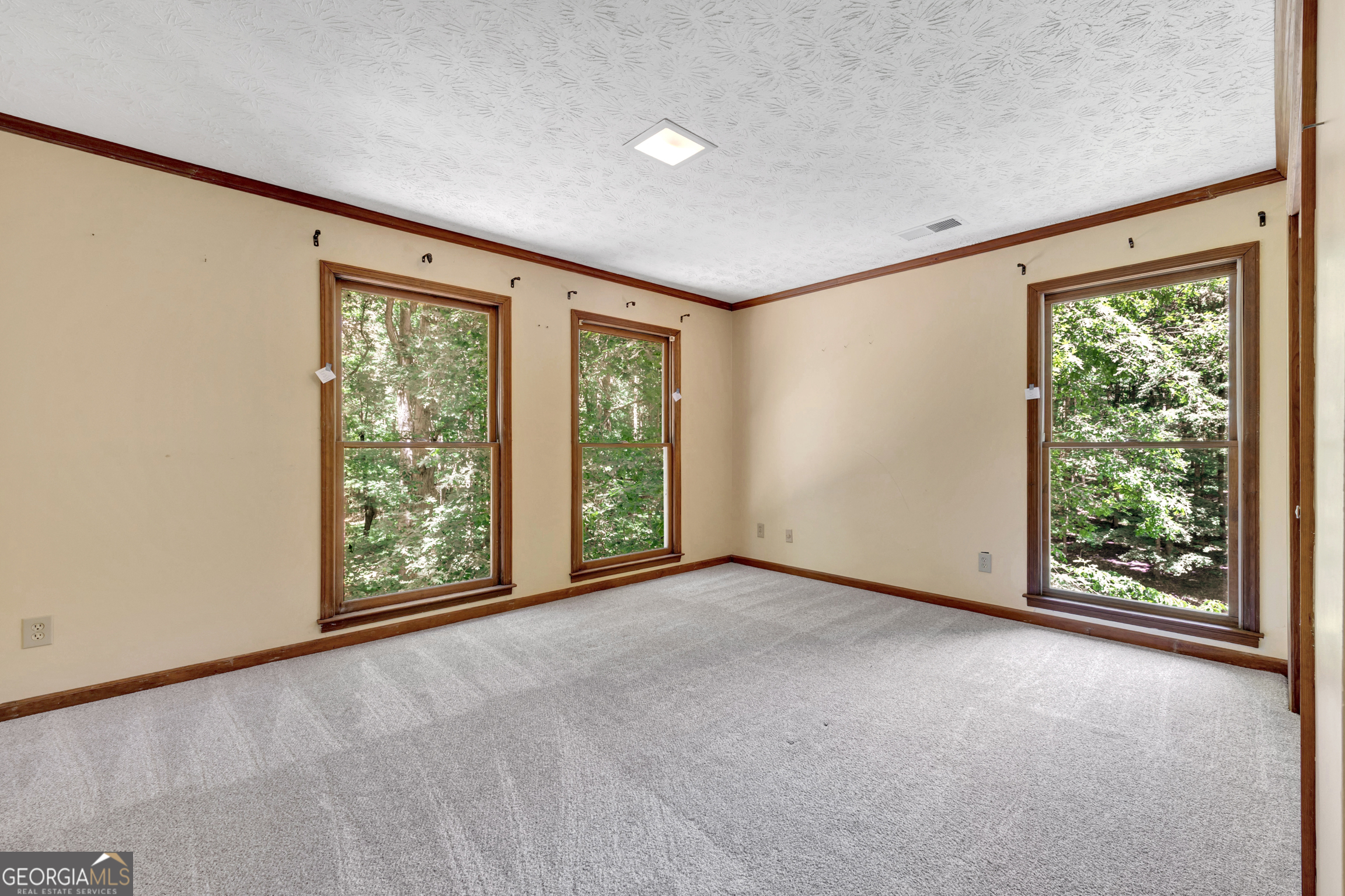 400 River Cove Road Social Circle, GA 30025 - Photo 45 of 83 a view of an empty room with a window