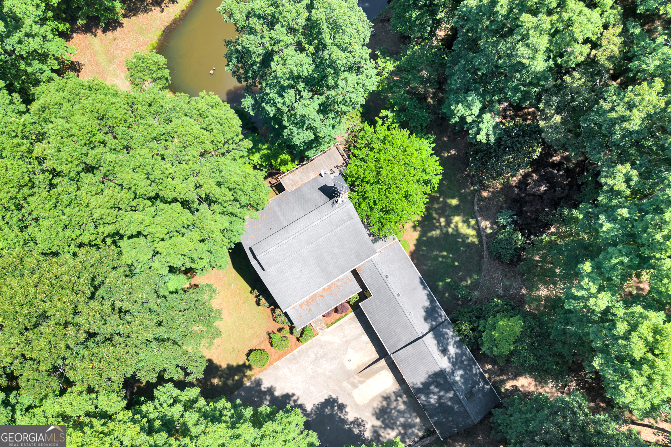 400 River Cove Road Social Circle, GA 30025 - Photo 75 of 83 an aerial view of a house with a yard