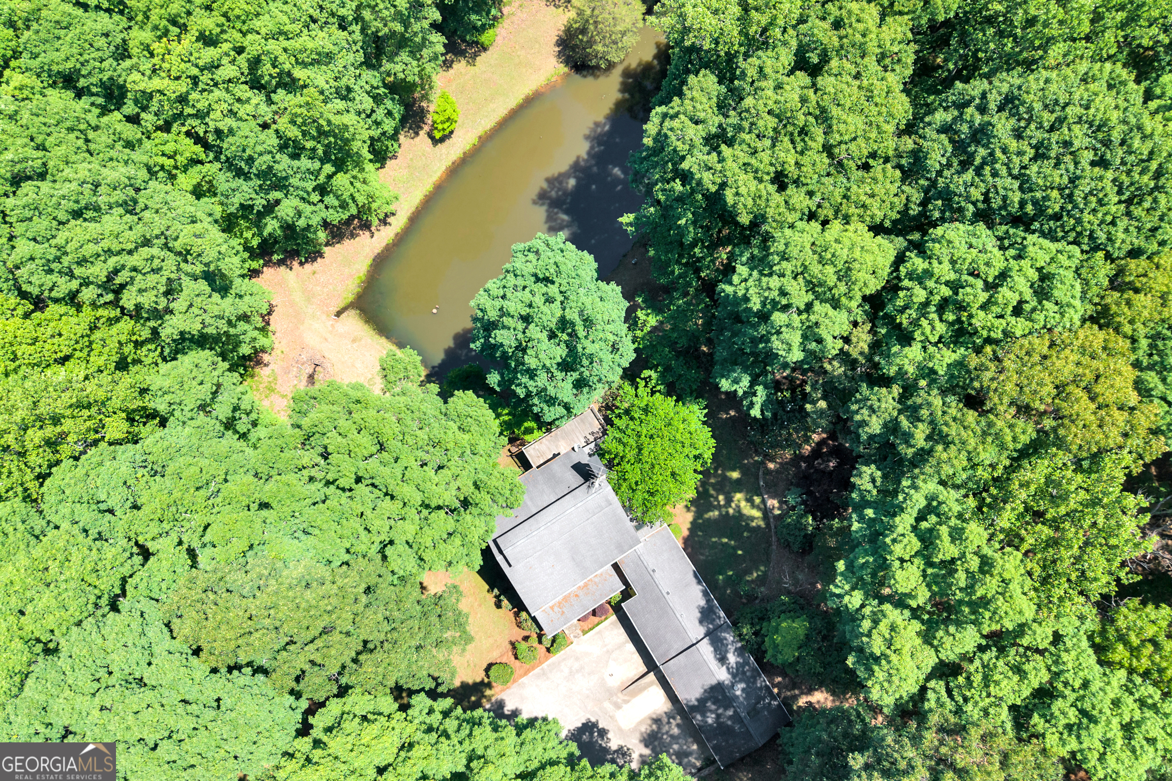 400 River Cove Road Social Circle, GA 30025 - Photo 76 of 83 an aerial view of a house with a yard and lake view