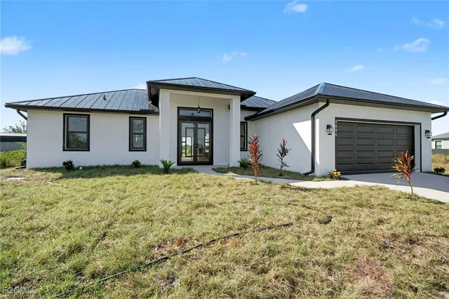 a house view with a backyard space