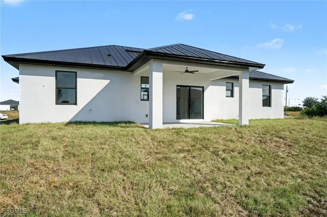 a house with yard in front of it