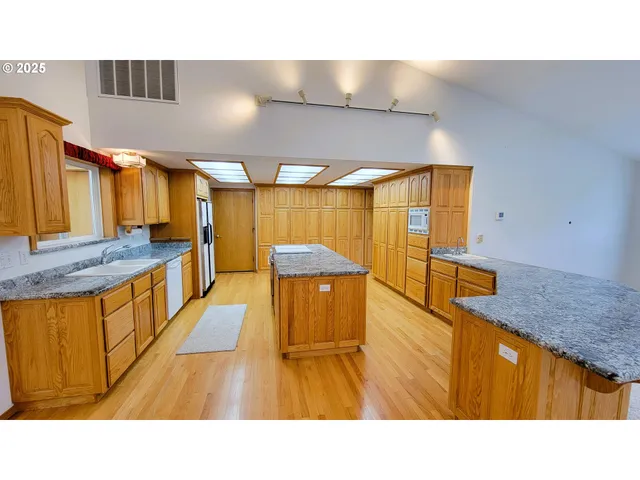a bathroom with a sink a mirror and a bathtub