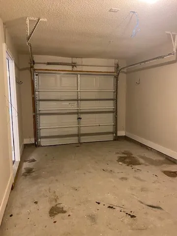 a view of a house with backyard porch and sitting area