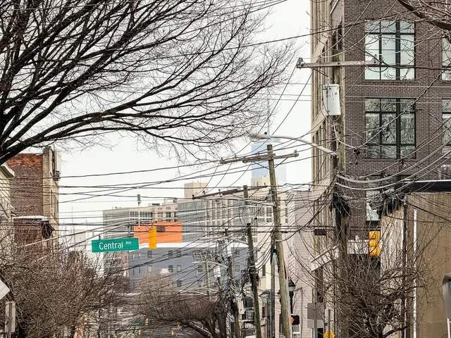 a view of street with a house