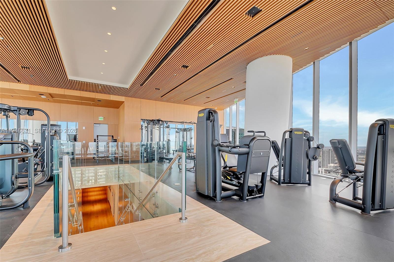 300 Biscayne Blvd Way, Unit 2808 Miami, FL 33131 - Photo 11 of 33 a living room with lots of furniture and a flat screen tv