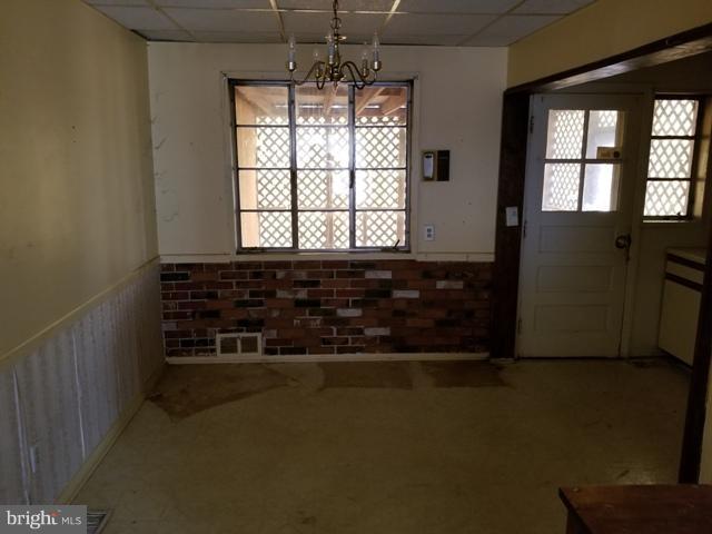 442 Old Home Road Baltimore, MD 21206 - Photo 3 of 12 en empty room with windows