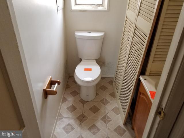 442 Old Home Road Baltimore, MD 21206 - Photo 4 of 12 a bathroom with a toilet and a shower