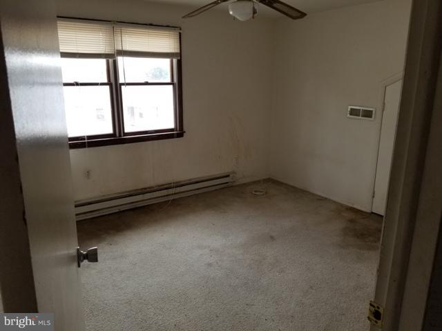 442 Old Home Road Baltimore, MD 21206 - Photo 8 of 12 an empty room with a window