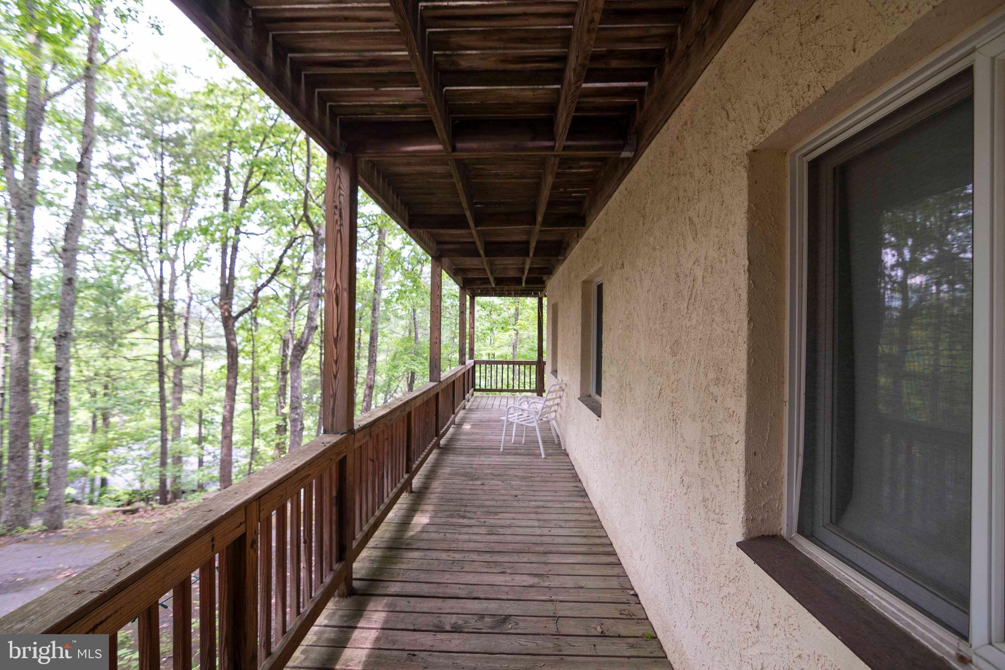 272 Fritzel Way Mount Jackson, VA 22842 - Photo 39 of 60 a view of a porch with wooden floor and stairs
