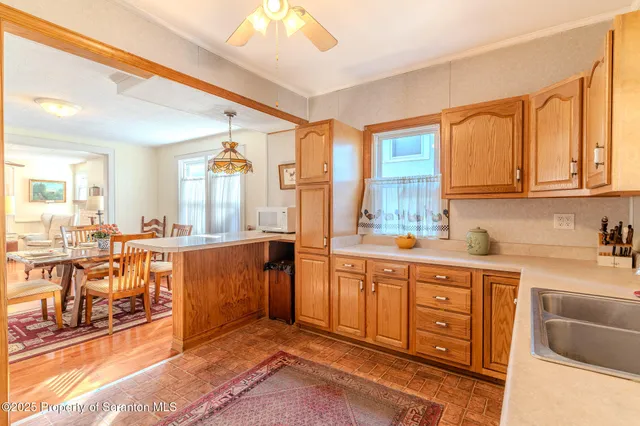 a view of a kitchen with cabinets
